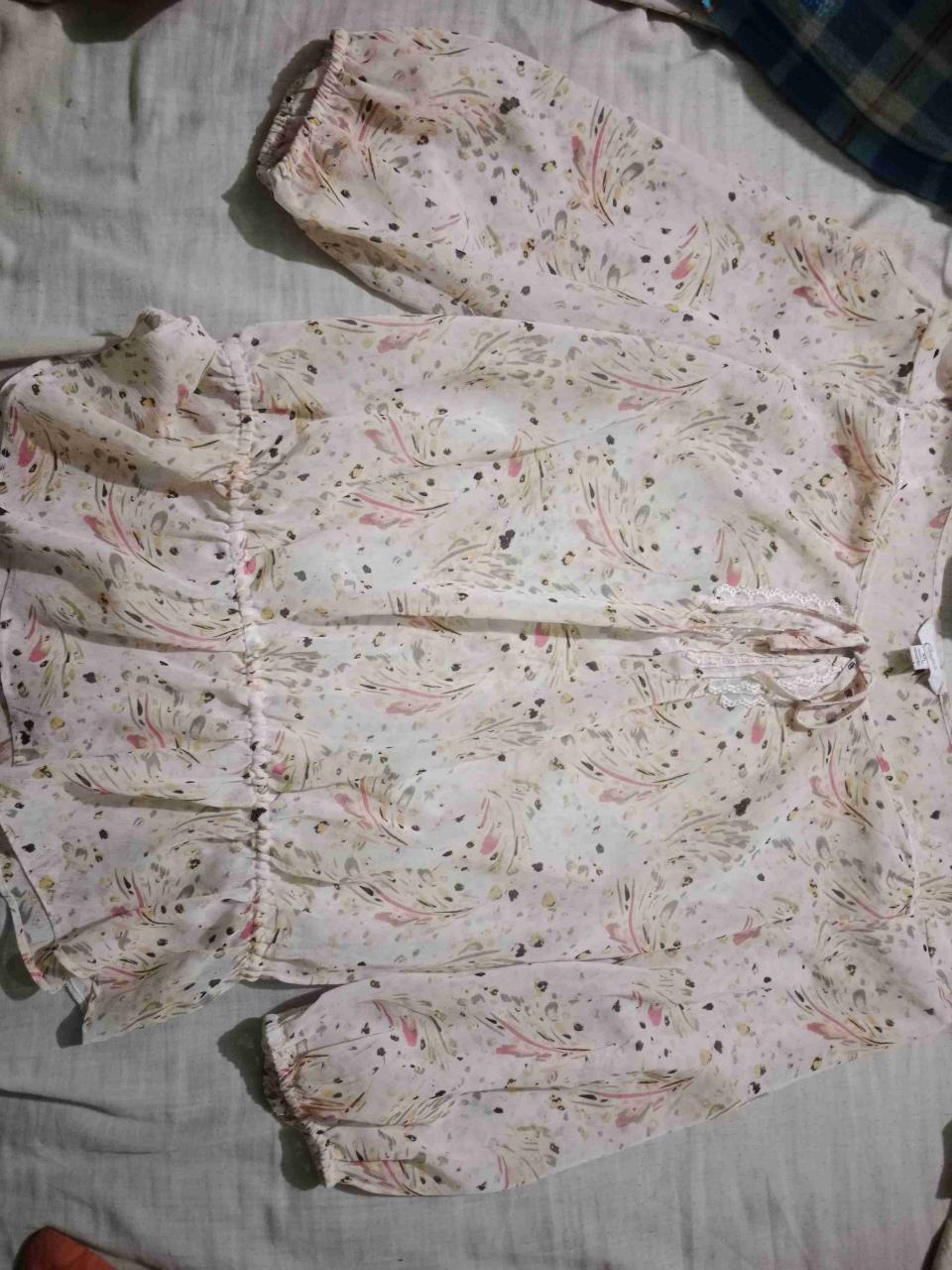 Blusa estampada manga larga