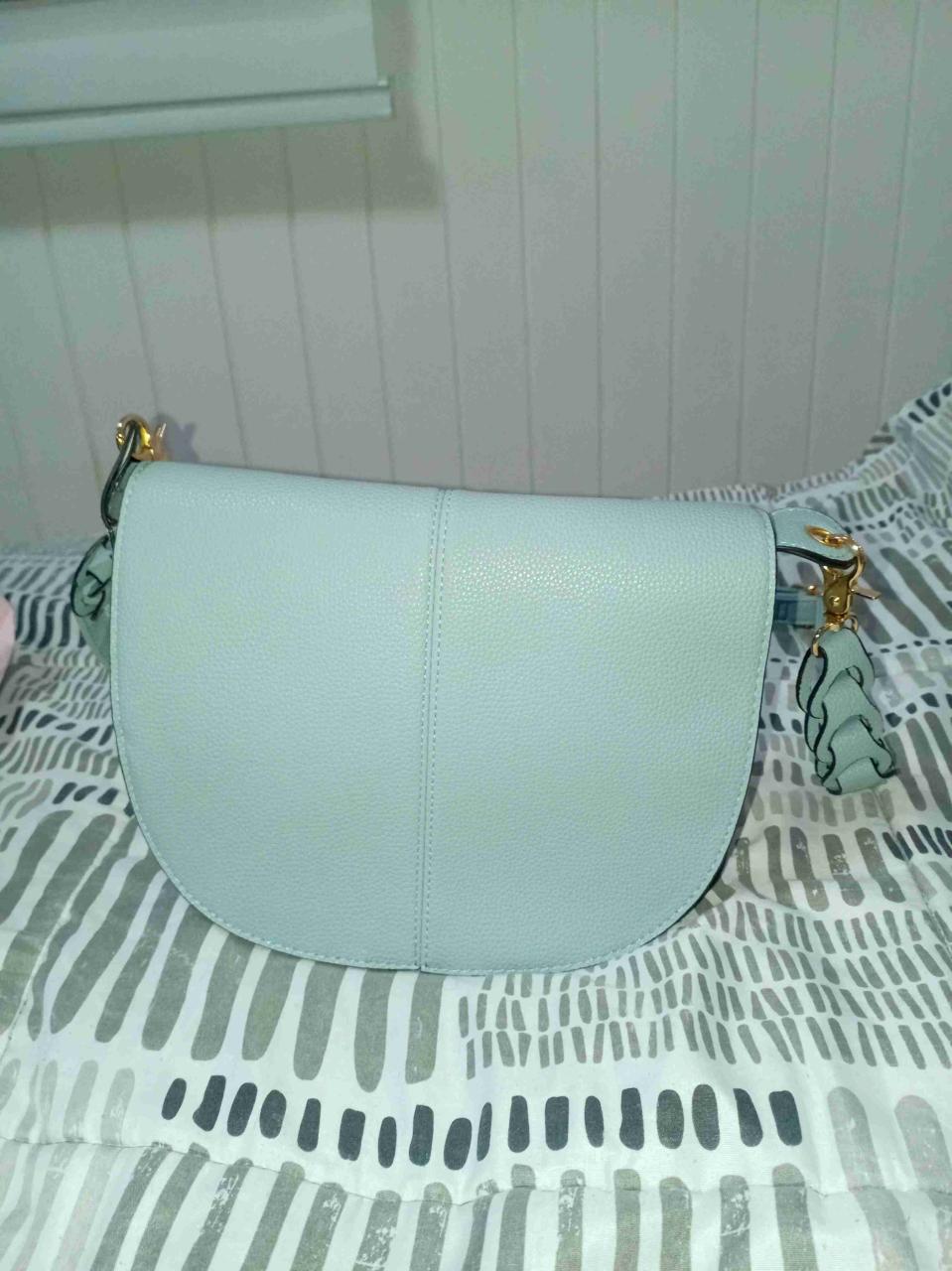 Cartera cruzada azul claro