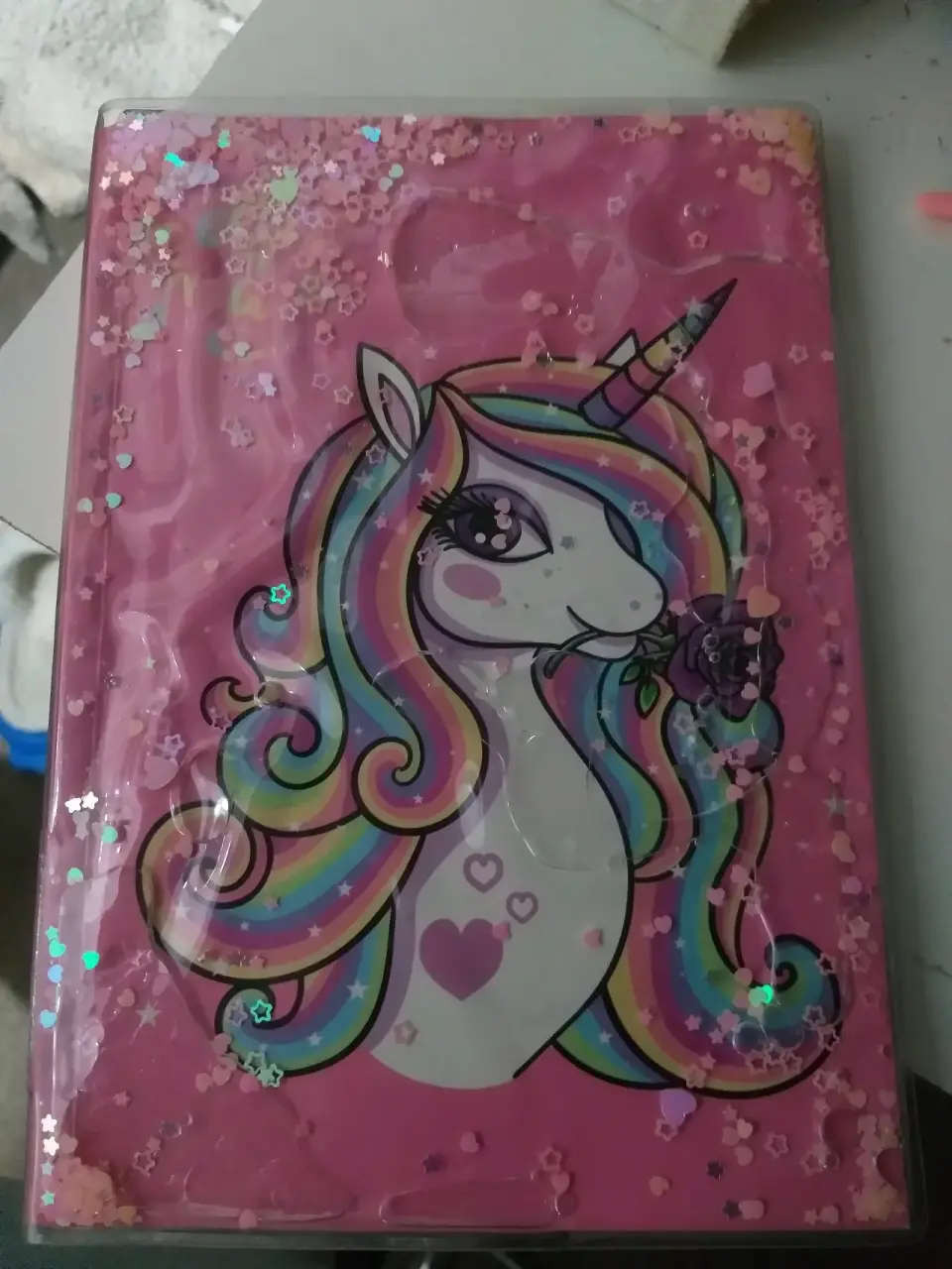 Diario con unicornio brillante