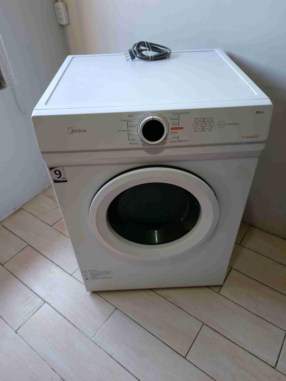 Secadora Midea 9 kg blanca - miniatura 1