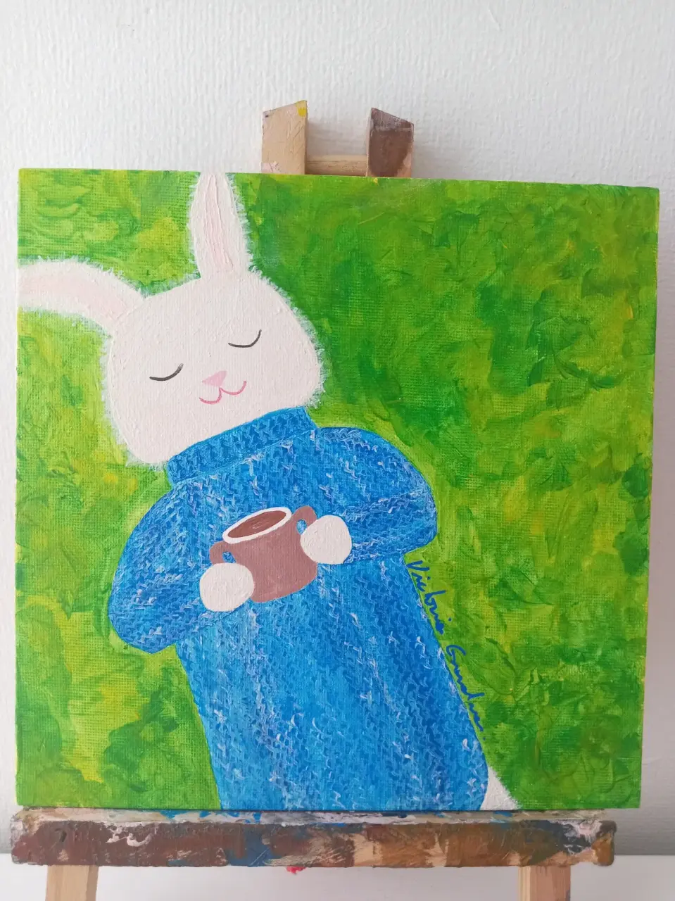 Pintura conejo azul con taza