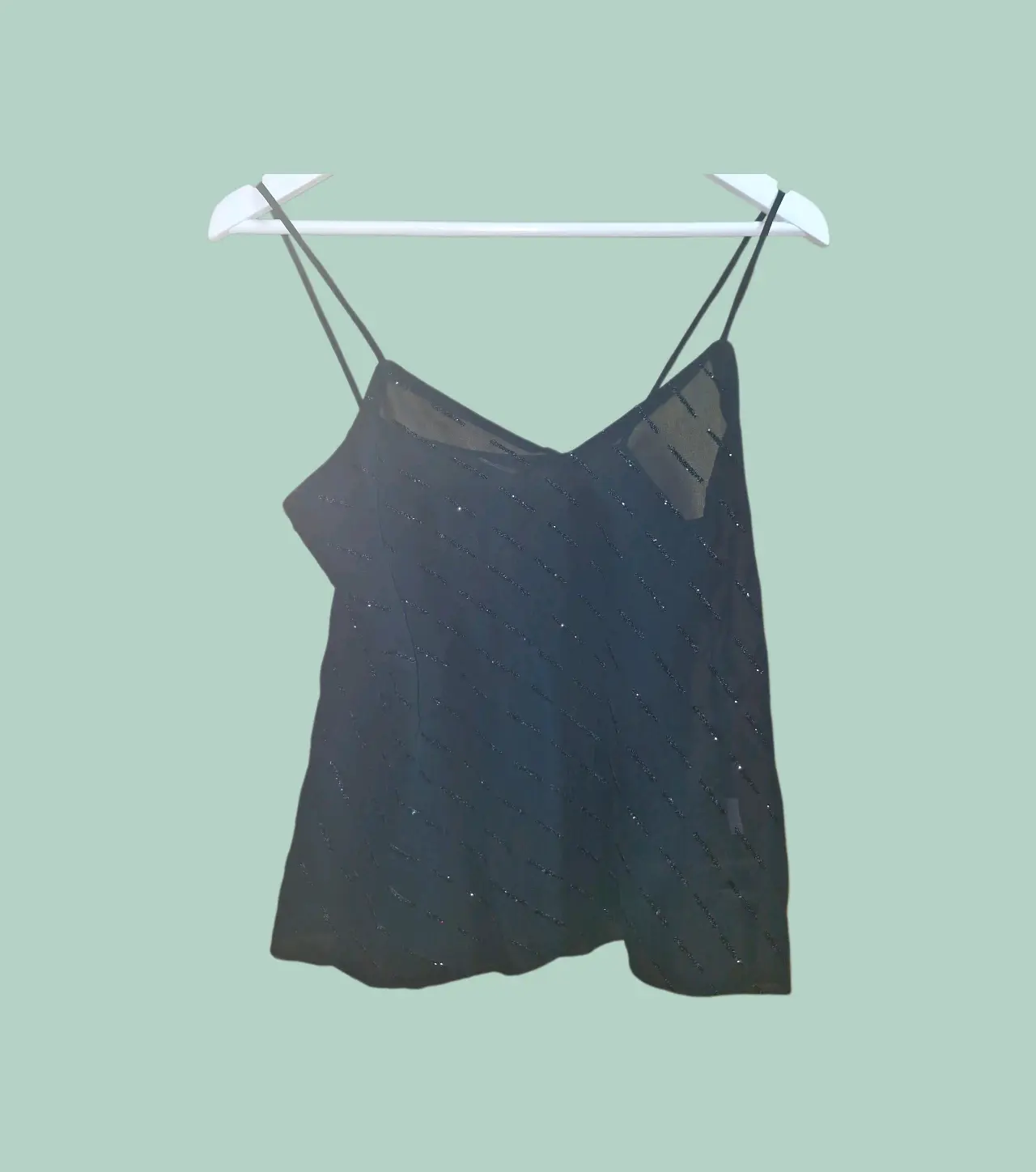 Blusa negra de tirantes brillante