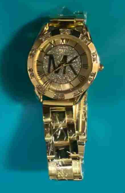 Reloj dorado con diseño brillante - miniatura 3