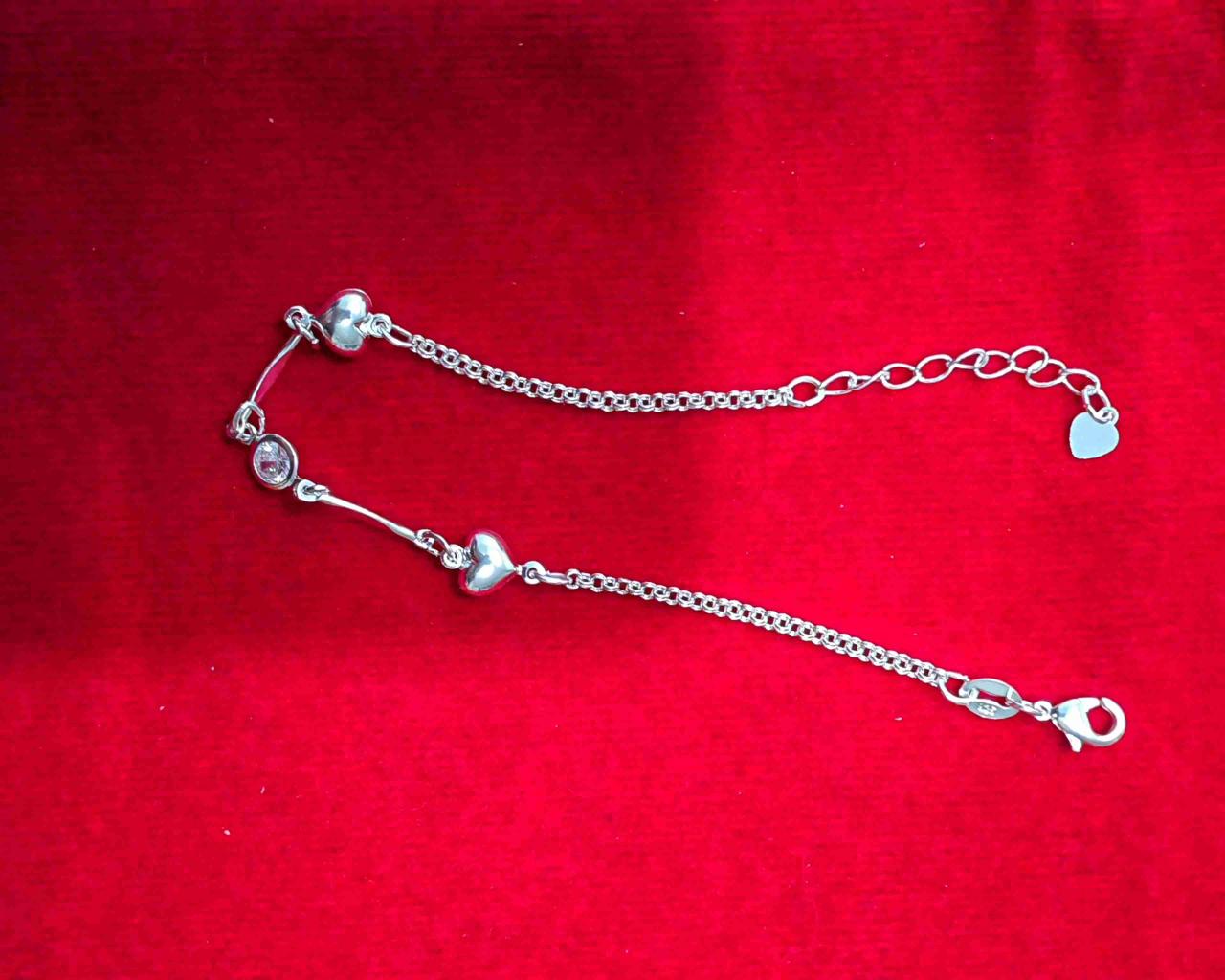 Pulsera de plata con corazones - miniatura 1