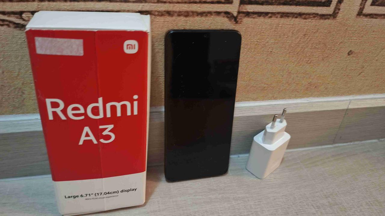 Teléfono Redmi A3 con cargador - miniatura 1