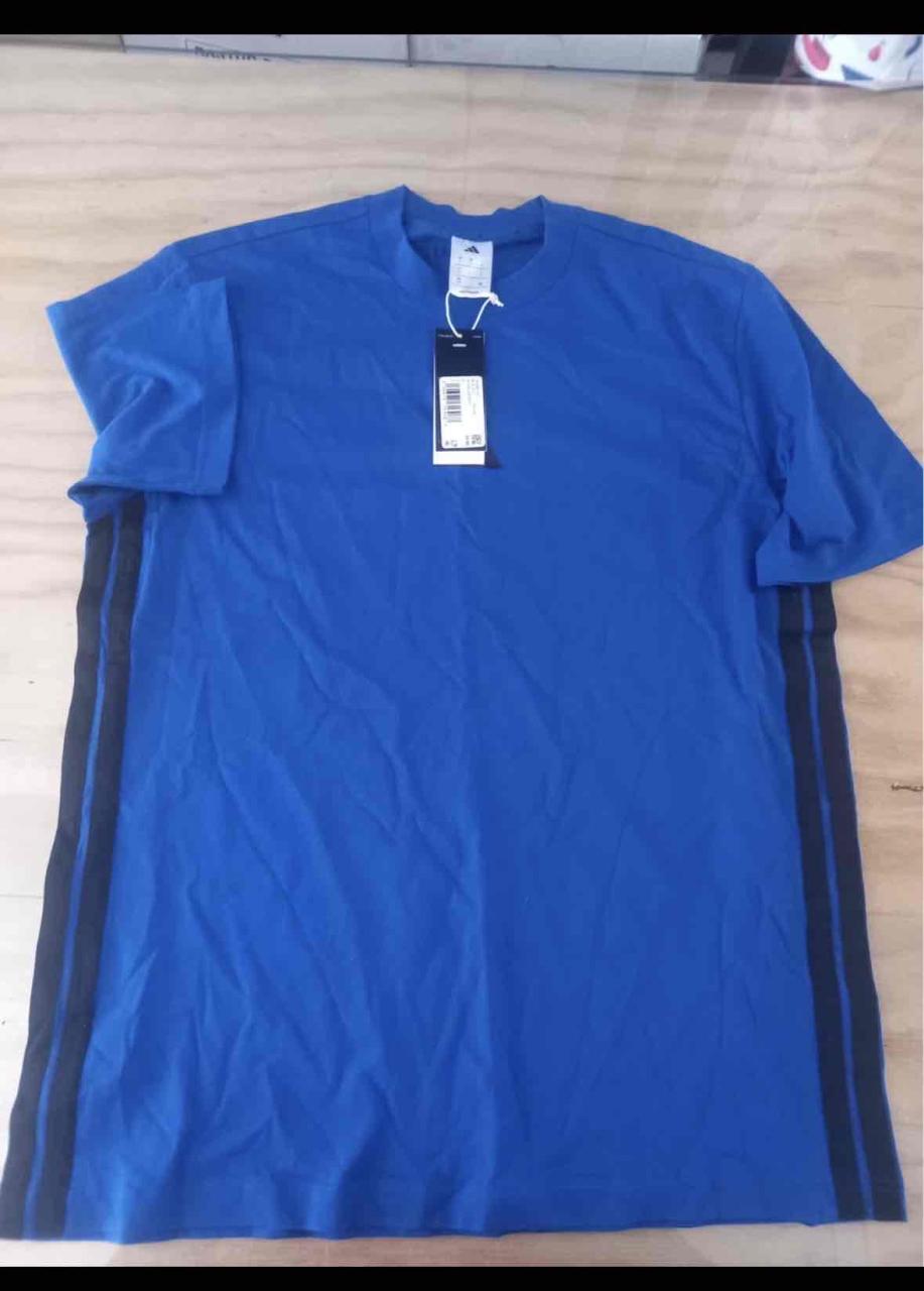Polera azul Adidas  con etiqueta - miniatura 1