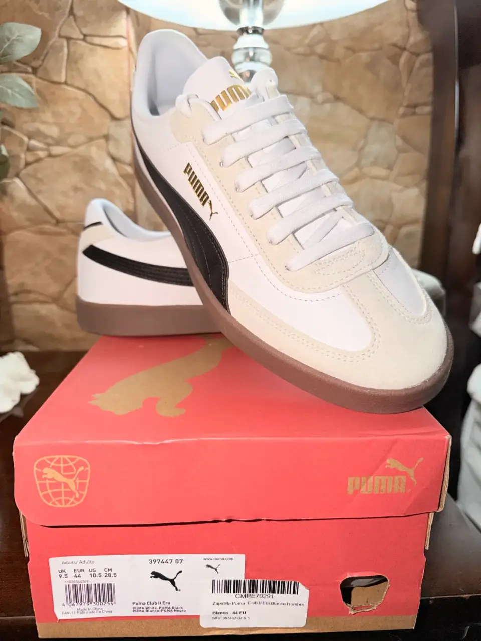Zapatillas Puma blancas y negras - miniatura 1