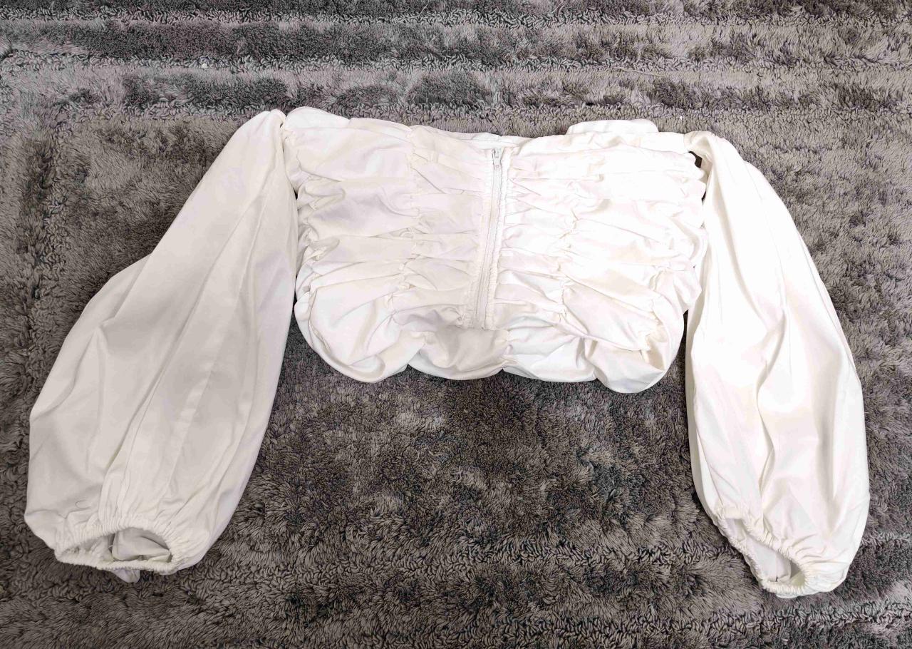 Blusa blanca con mangas abullonadas - miniatura 3
