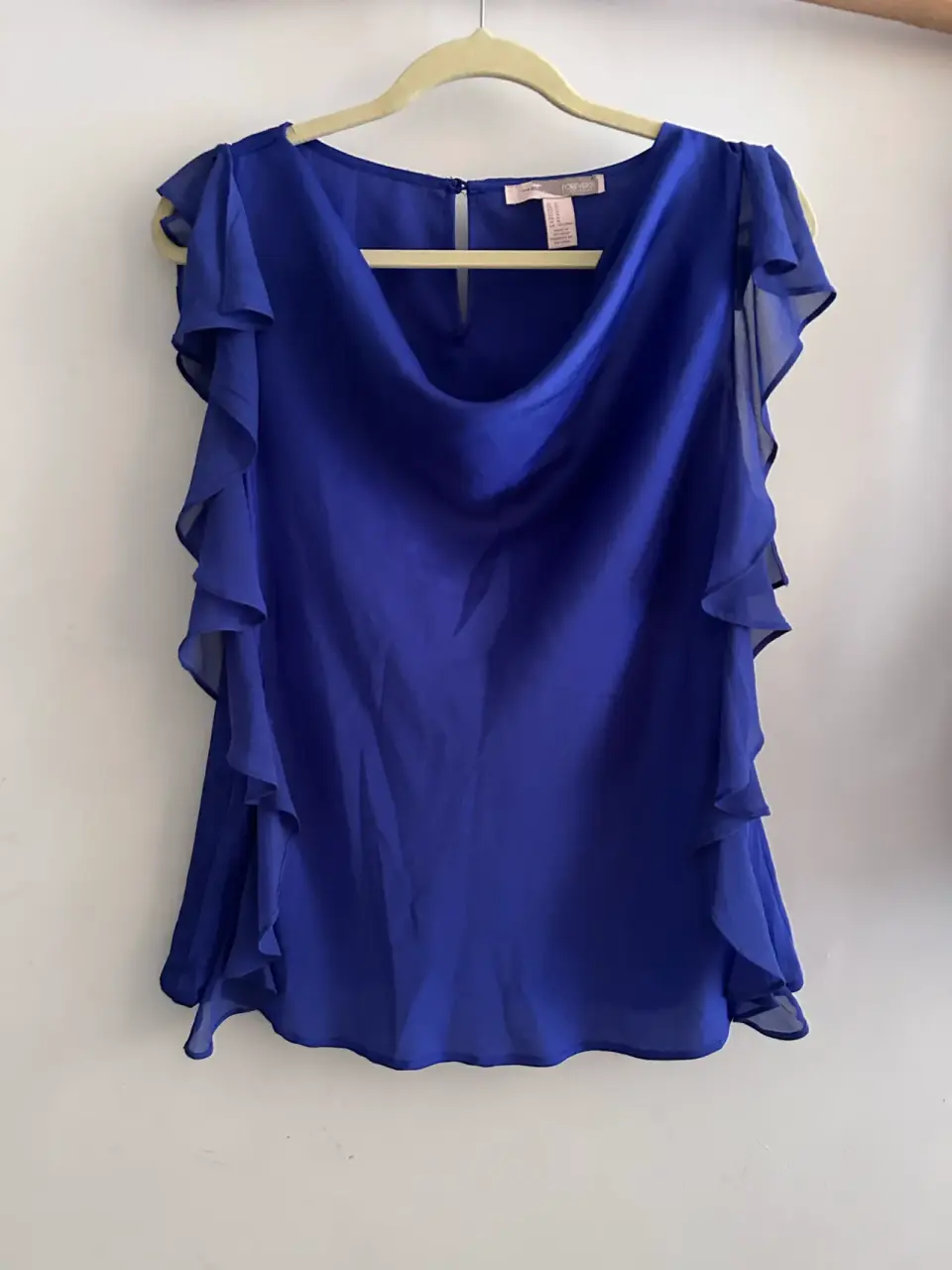 Blusa azul con vuelos - miniatura 2
