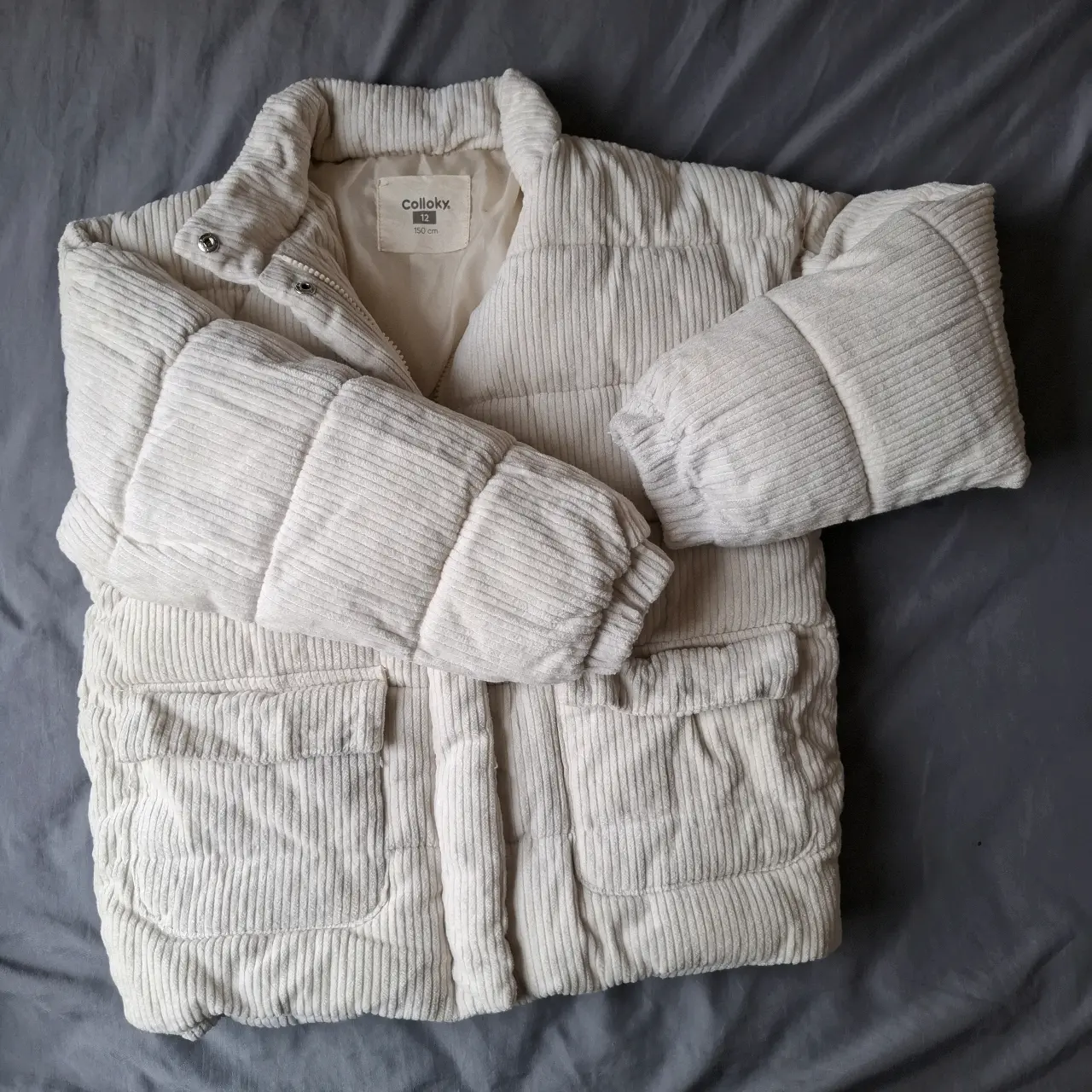 Chaqueta acolchada beige para niña