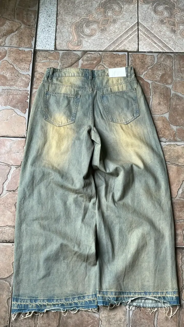 Jeans anchos con roturas - miniatura 2