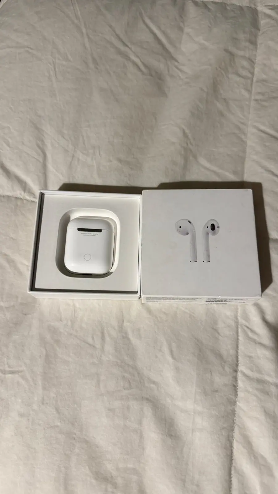Apple - Airpods segunda generación en caja - miniatura 1