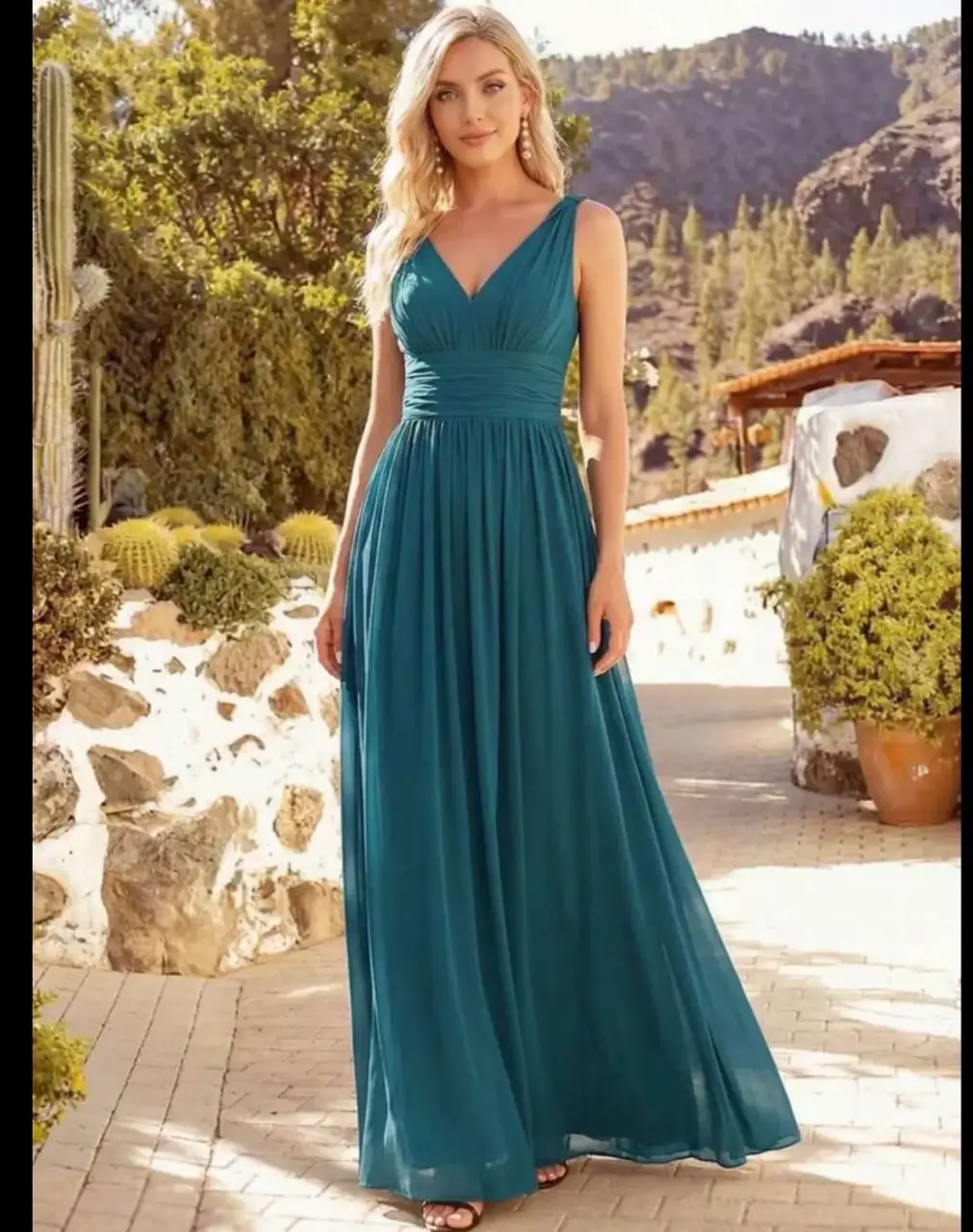 Vestido largo azul petróleo elegantemente - miniatura 1