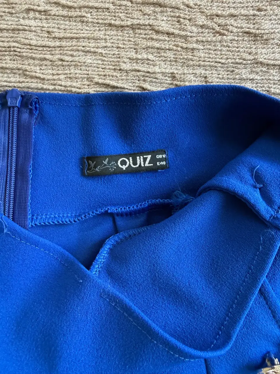 Pantalones azules con botones - miniatura 2