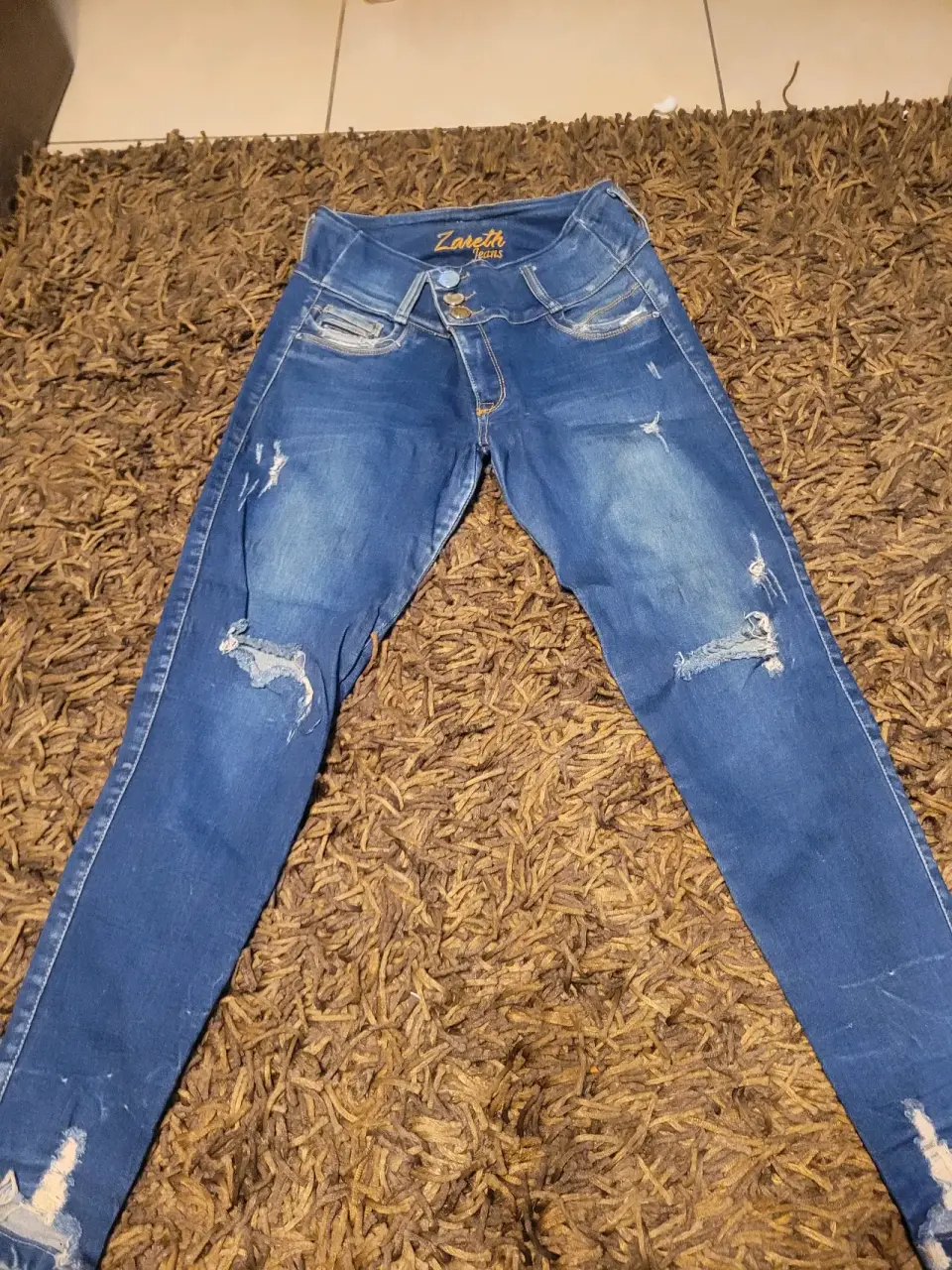 Jeans desgastados color azul - miniatura 1