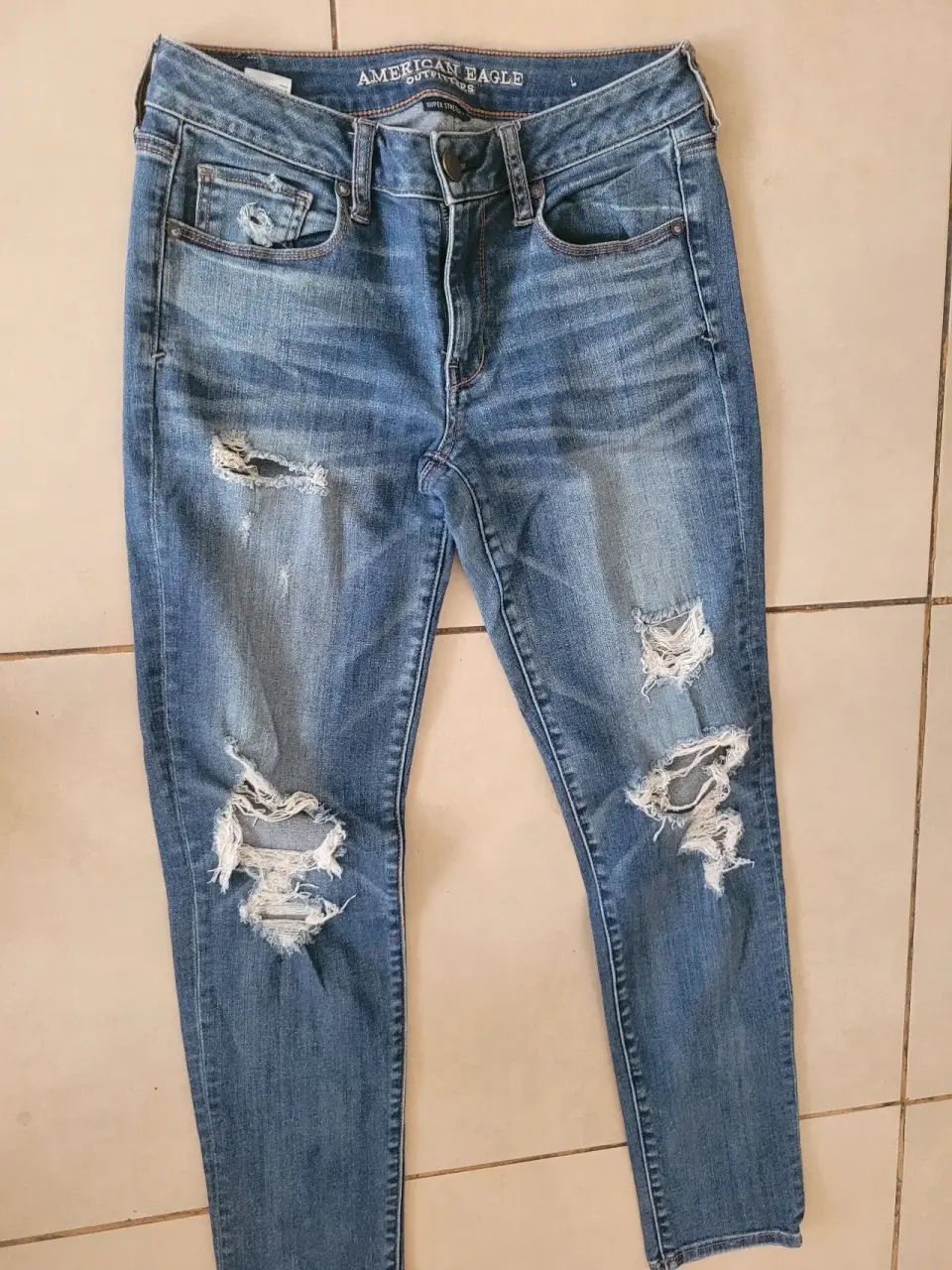 Jeans rasgados talla mediana - miniatura 1