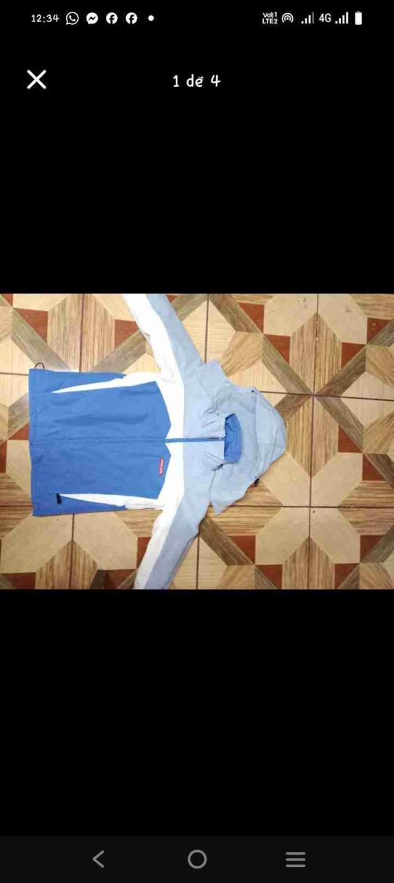 Chaqueta deportiva azul y blanca - miniatura 1