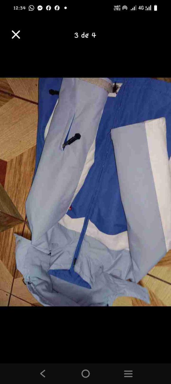 Chaqueta deportiva azul y blanca - miniatura 2