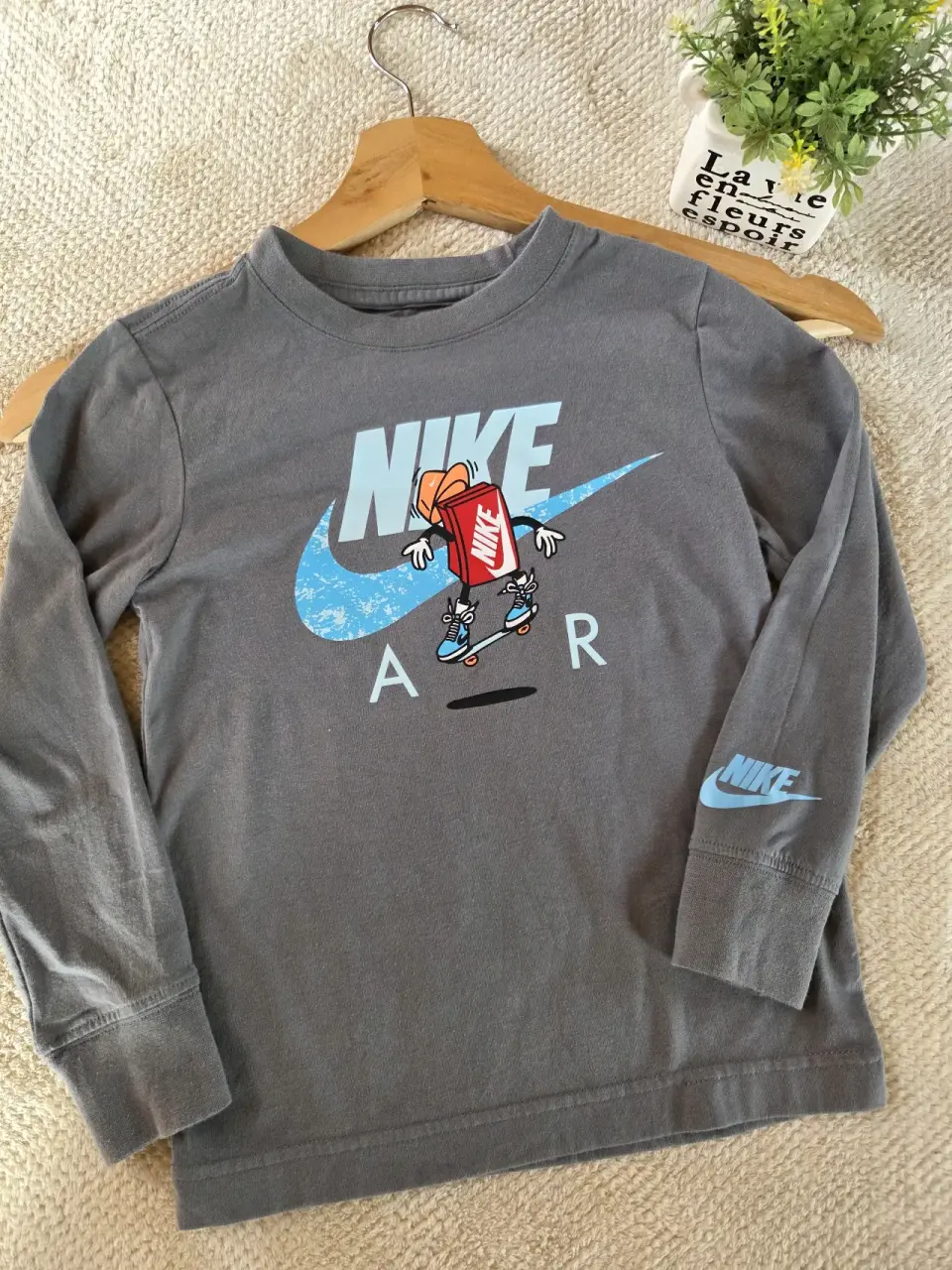 Polera manga larga Nike gris. Talla 3/4