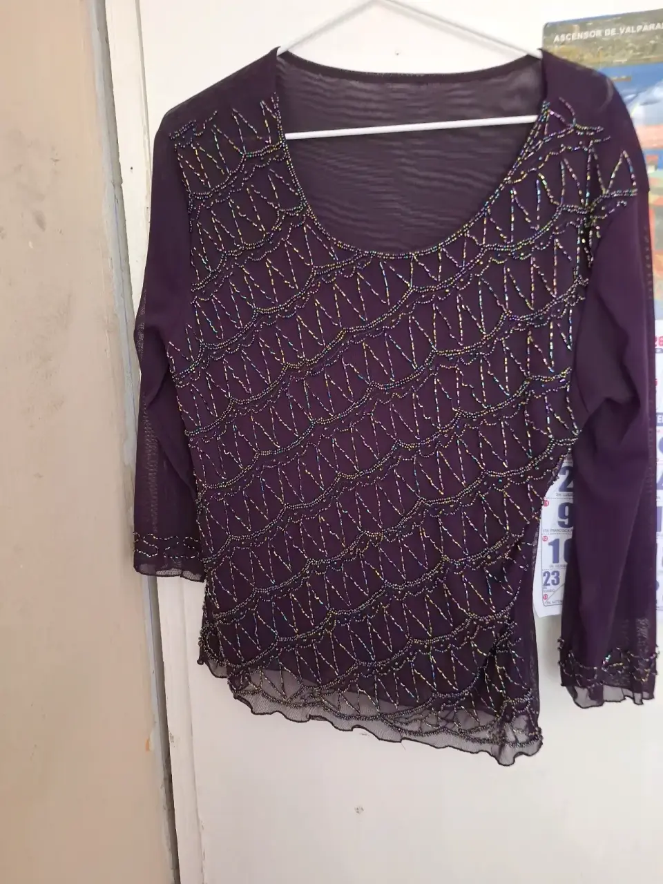 Blusa morada con lentejuelas