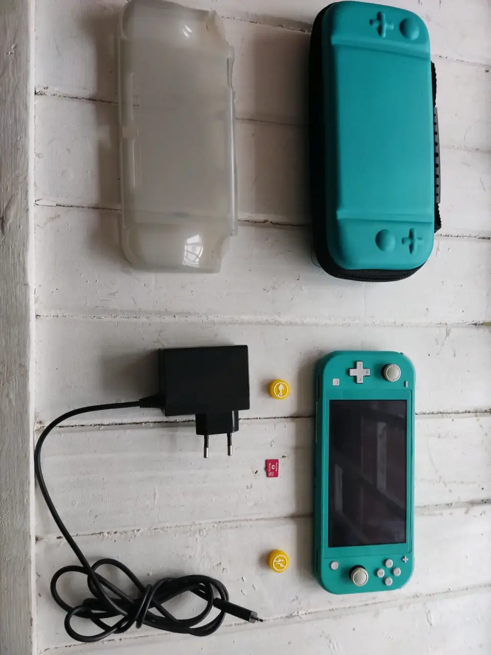 Nintendo switch lite turquesa con extras - miniatura 1
