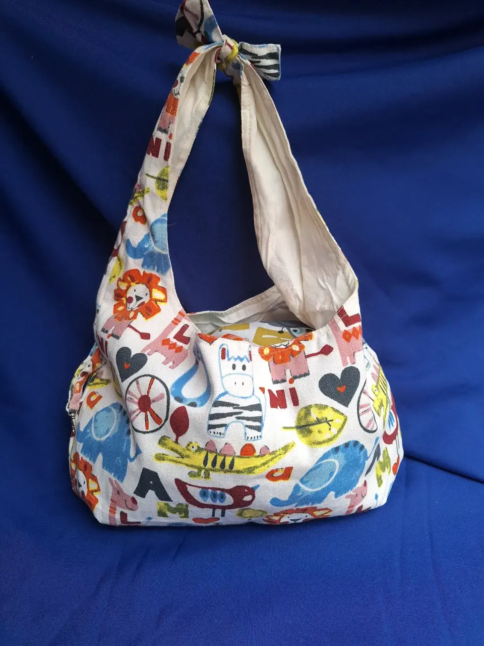Bolso estampado infantil colorido - miniatura 1