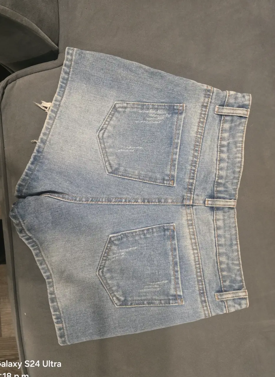 Falda shorts de mezclilla con roturas - miniatura 2