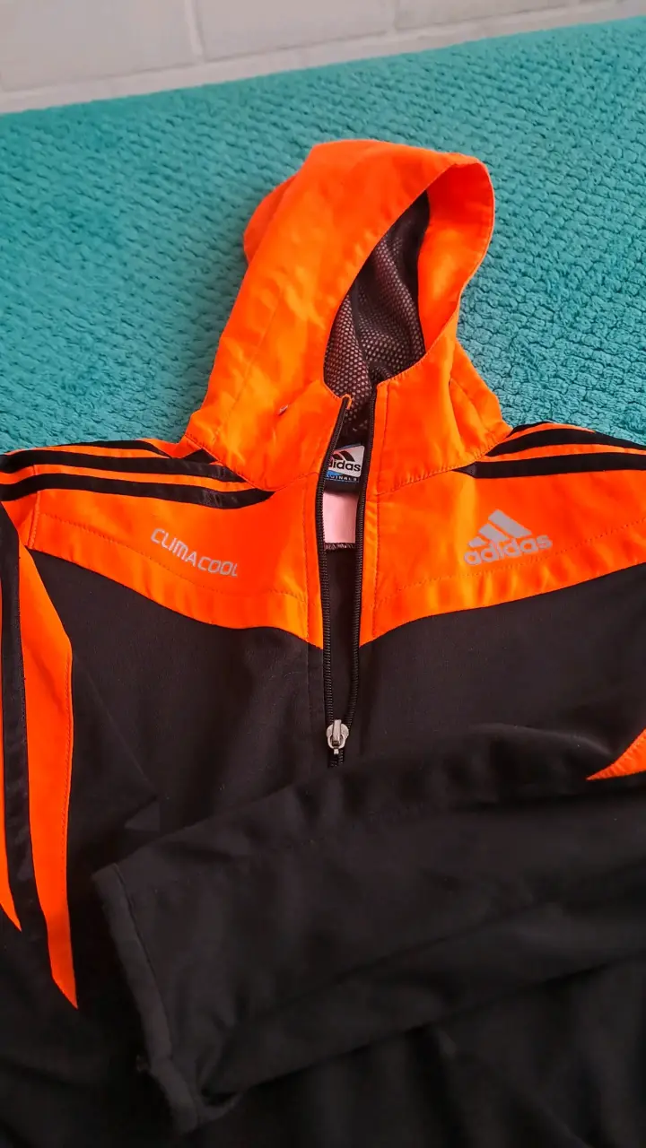 Chaqueta deportiva Adidas naranja y negra - miniatura 1
