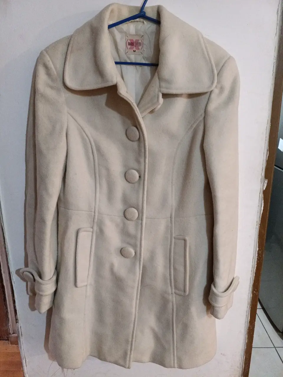 Abrigo beige de lana largo