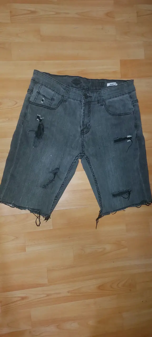 Shorts jeans rasgados  de hombre - miniatura 1