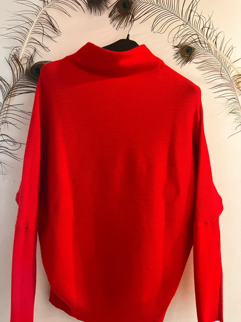 Suéter rojo cuello alto