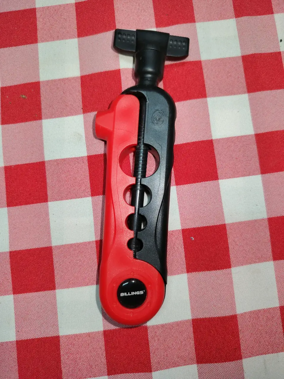 Llave para cargar carretes de pesca roja - miniatura 2
