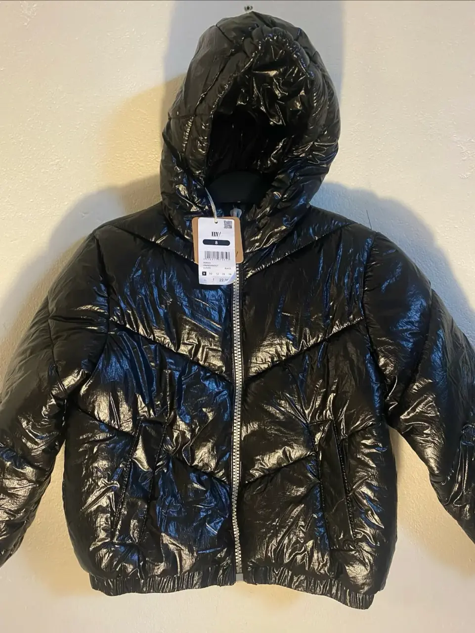 Chaqueta talla 8 acolchada negra con capucha
