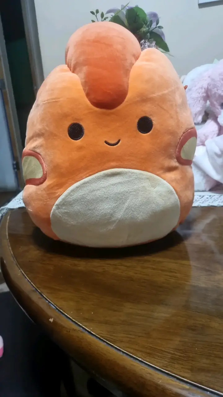 Squishmallow camaleon naranja