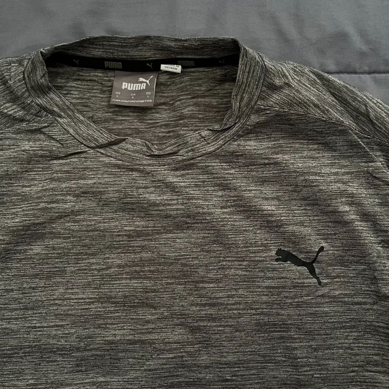 Polera deportiva Puma gris