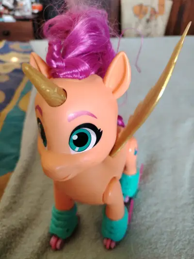 Juguete unicornio rodante - miniatura 1