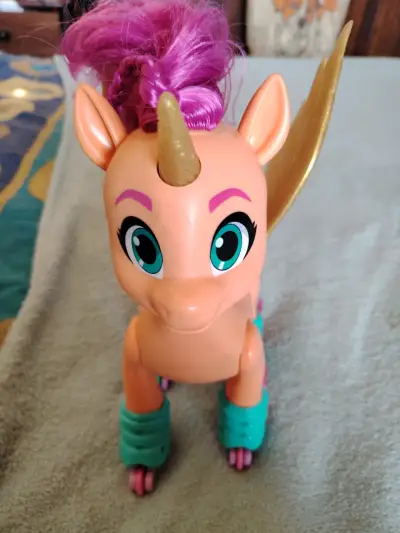 Juguete unicornio rodante - miniatura 2