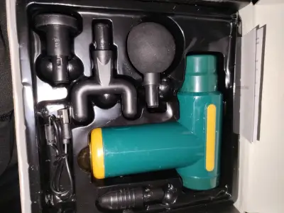 Pistola de masaje eléctrica portátil - miniatura 1
