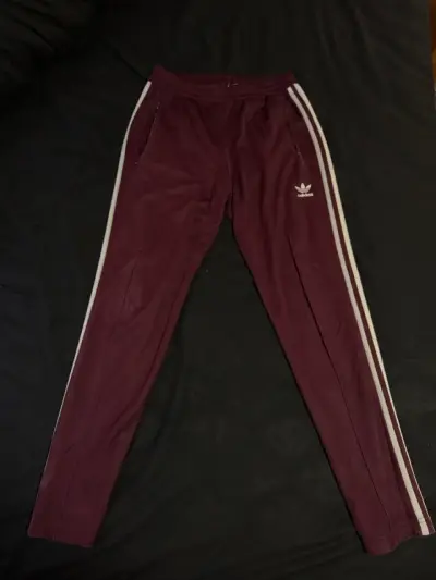 Pantalones deportivos burdeos con franjas - miniatura 1
