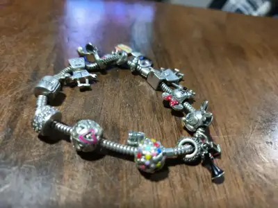 Pulsera Pandora de plata con 11 charms - miniatura 1