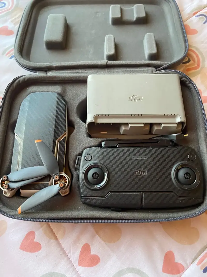 Drone DJI con control y baterías - 6