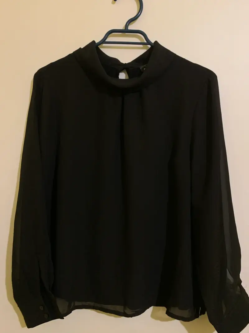 Blusa negra manga larga