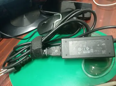 Cargador HP portátil original - miniatura 1