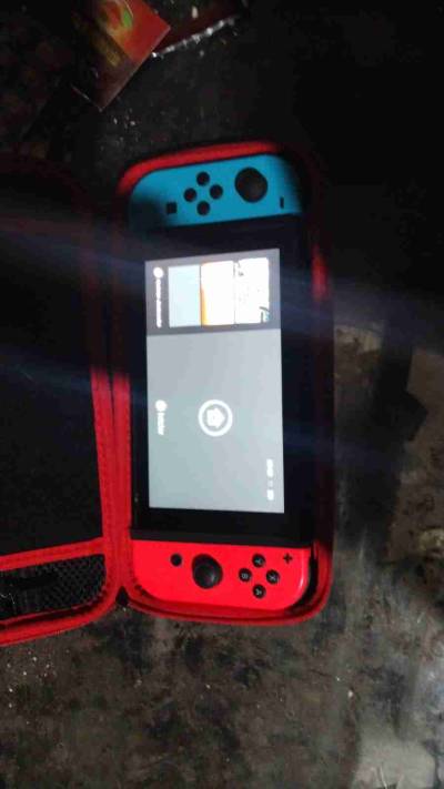 Consola Nintendo Switch neon usada - miniatura 2