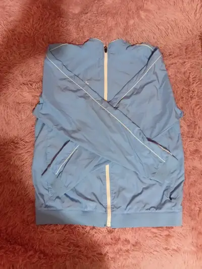 Chaqueta deportiva azul unisex - miniatura 1