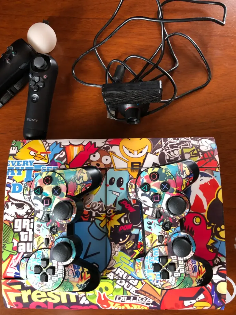 PlayStation 3 + PSMove + 5 Juegos - 2