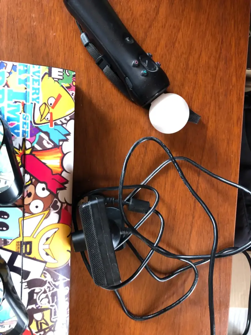 PlayStation 3 + PSMove + 5 Juegos - 4