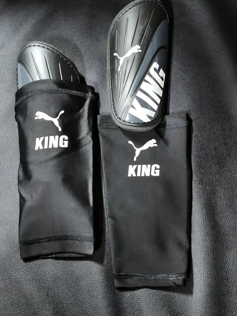 Canilleras Puma King negras - 2