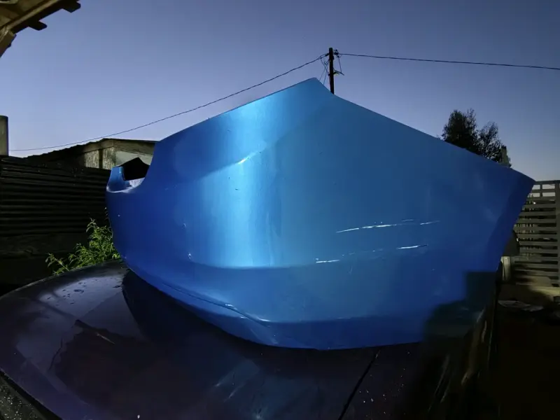 Parachoques trasero azul Chevrolet new sail - 4