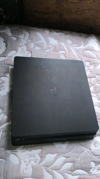 Consola PlayStation negra - miniatura 1